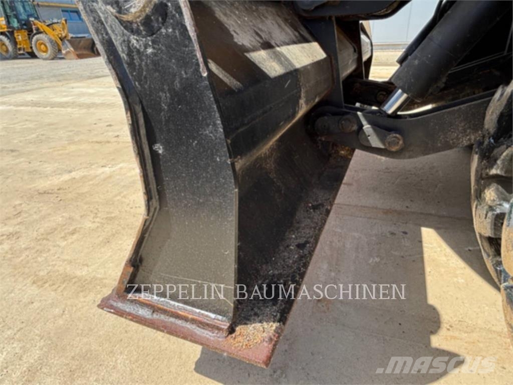 CAT M320F Gumikerekes kotrók