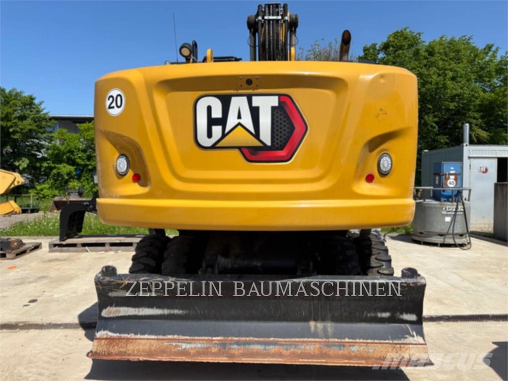 CAT M320F Gumikerekes kotrók