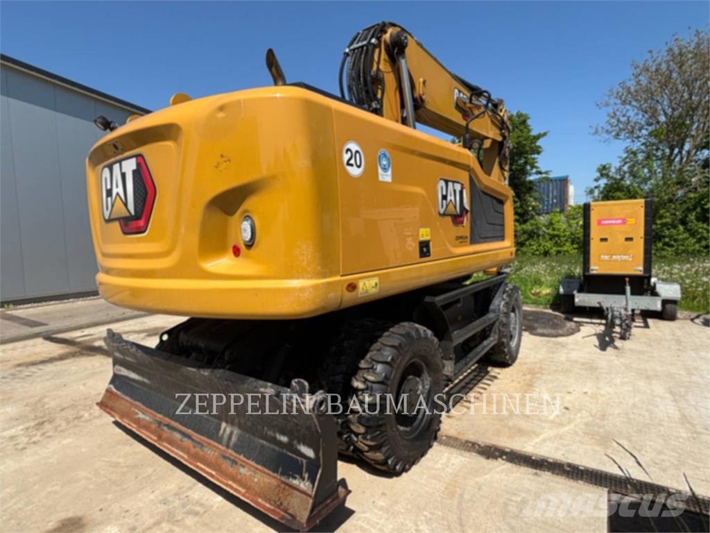 CAT M320F Gumikerekes kotrók