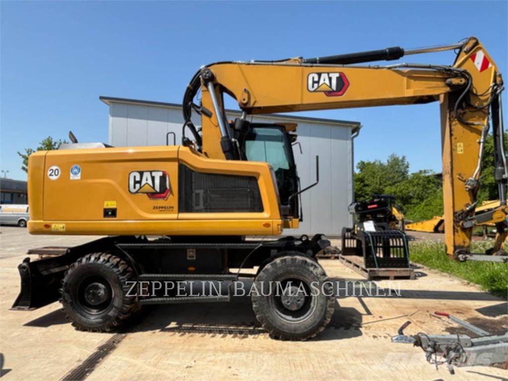CAT M320F Gumikerekes kotrók