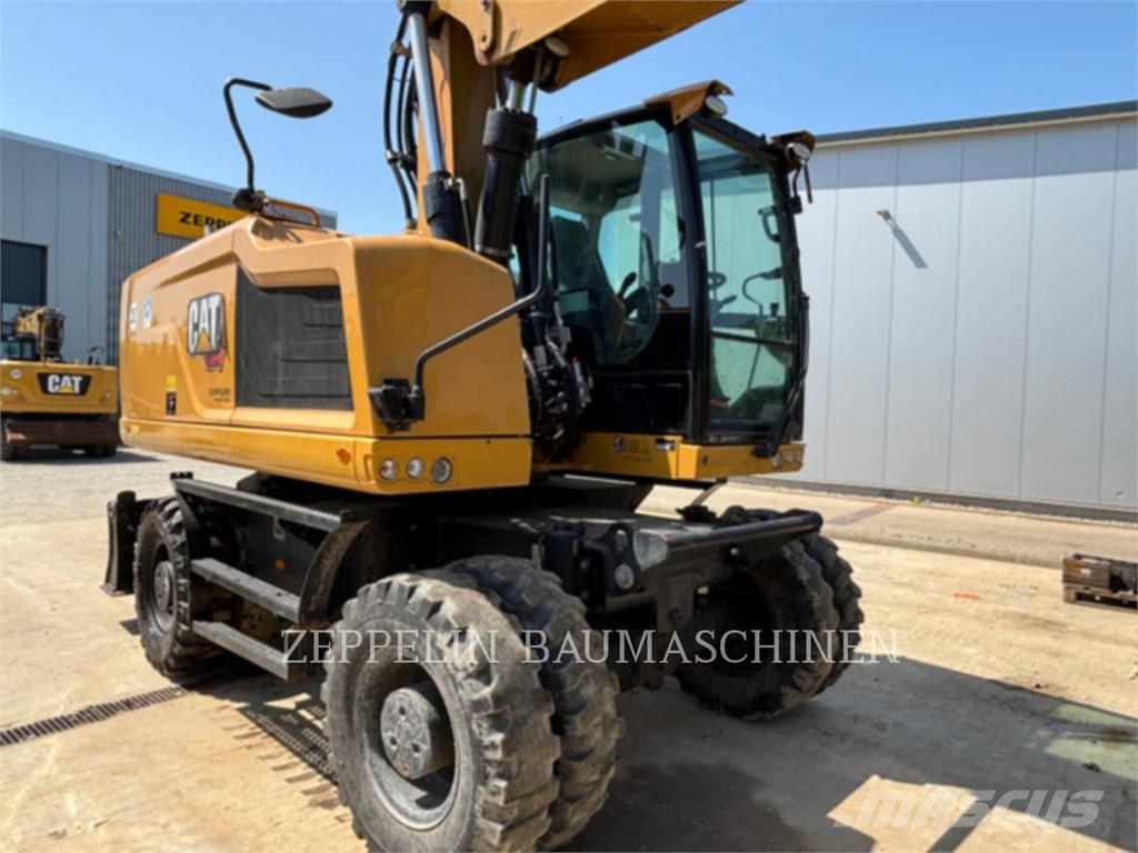 CAT M320F Gumikerekes kotrók