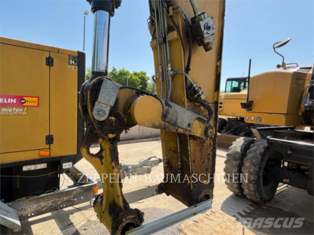 CAT M320F Gumikerekes kotrók