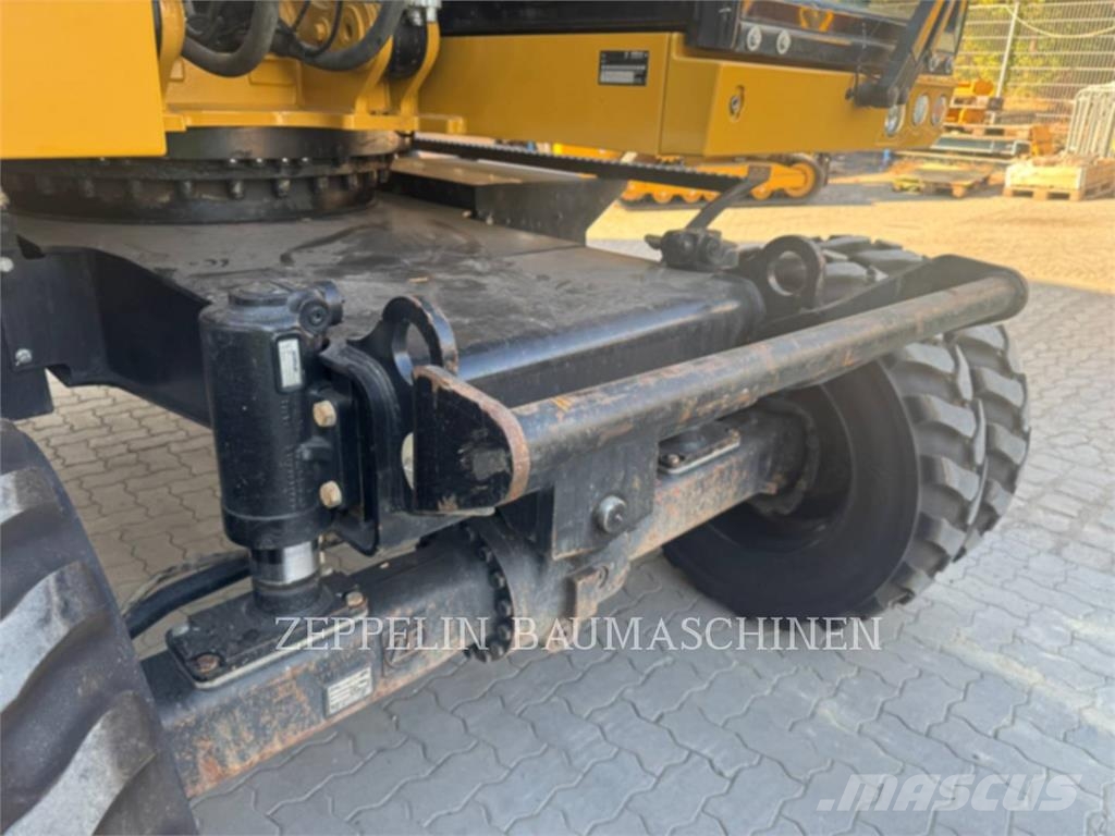 CAT M320F Bagri na kolesih