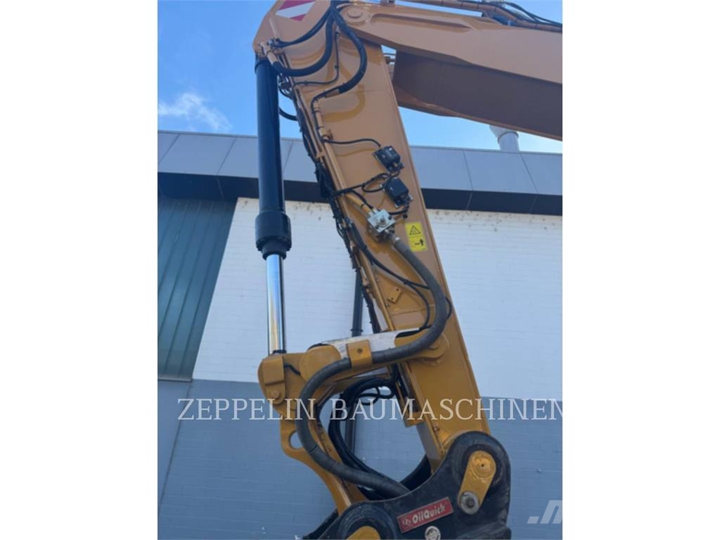CAT M320F Bagri na kolesih