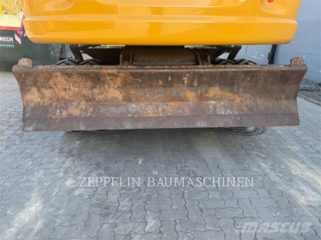 CAT M320F Bagri na kolesih