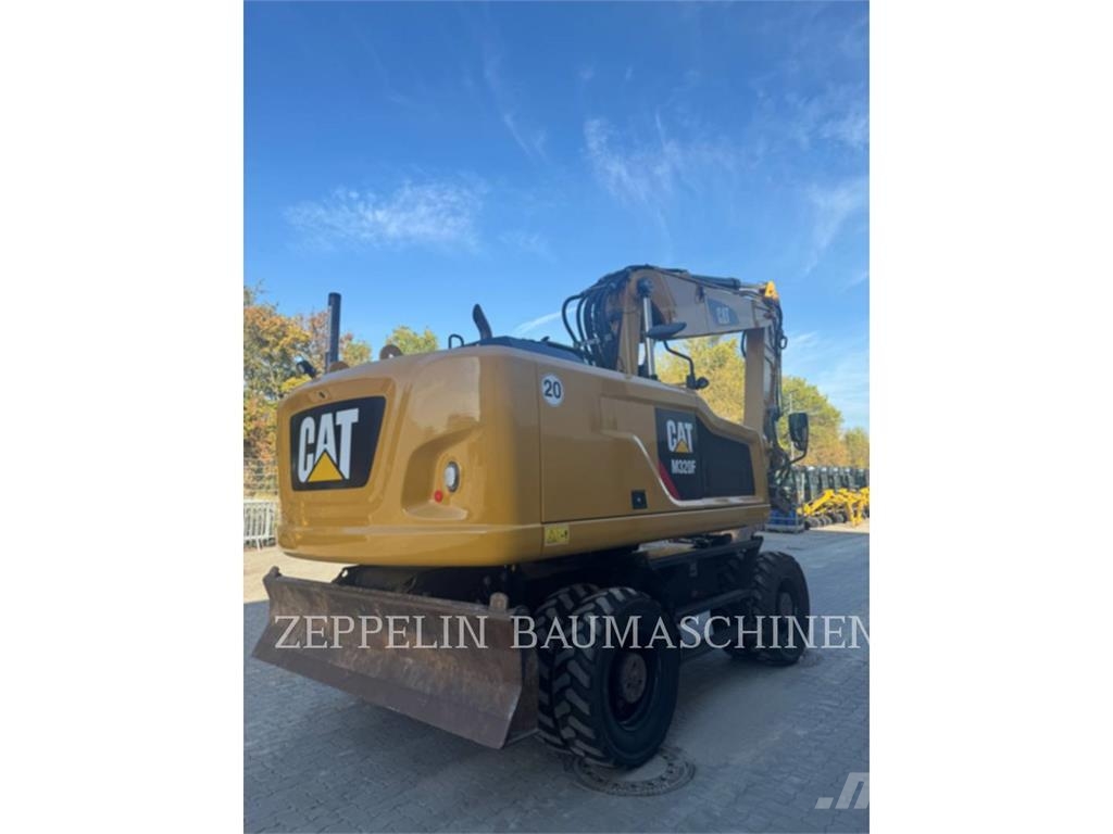 CAT M320F Bagri na kolesih