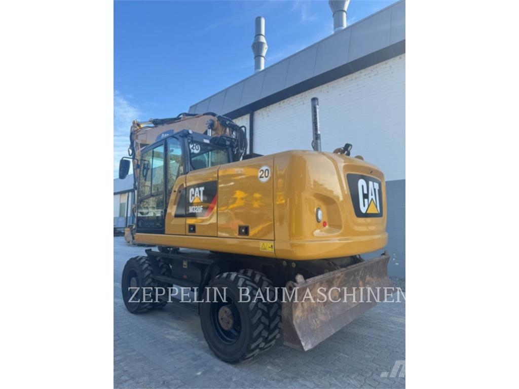 CAT M320F Bagri na kolesih