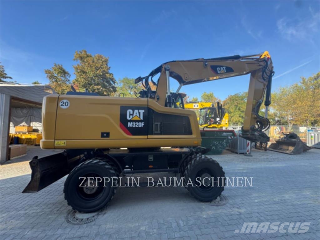 CAT M320F Bagri na kolesih