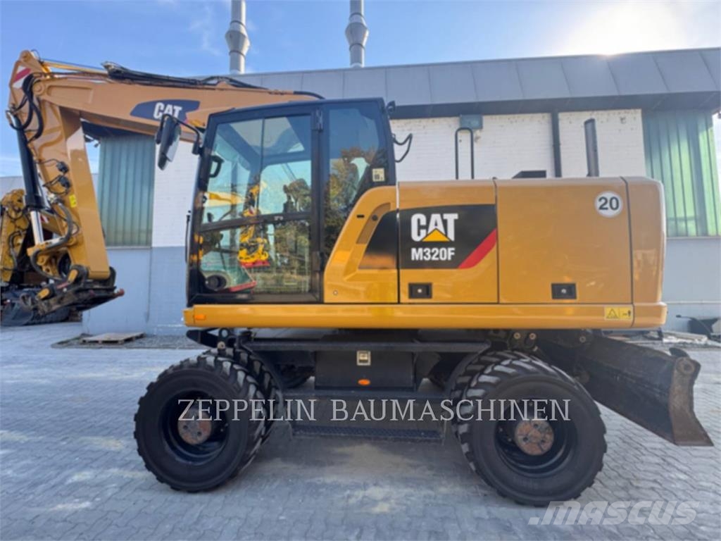 CAT M320F Bagri na kolesih