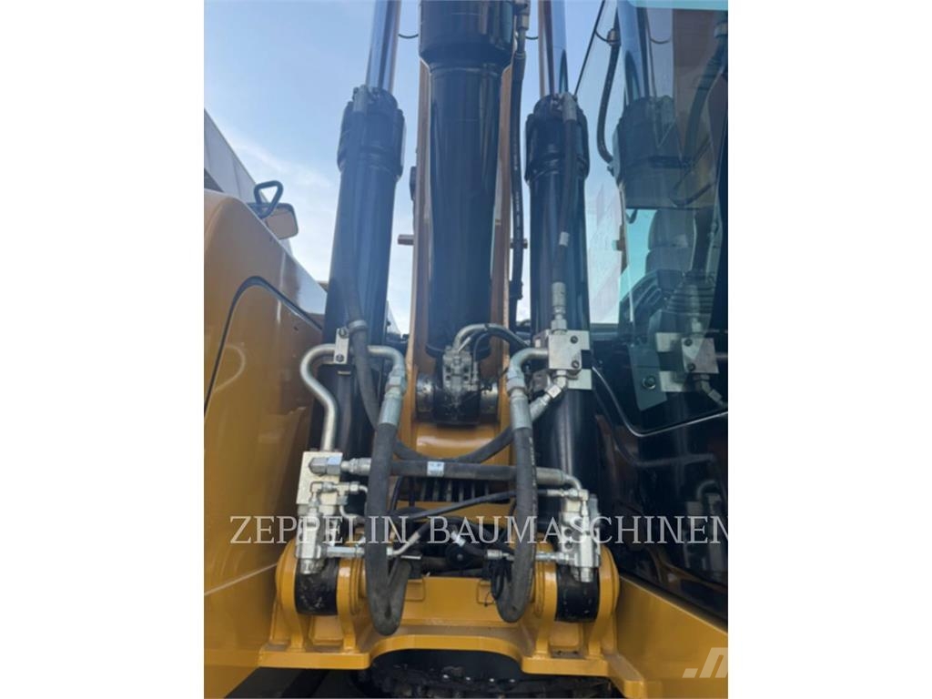 CAT M320F Bagri na kolesih