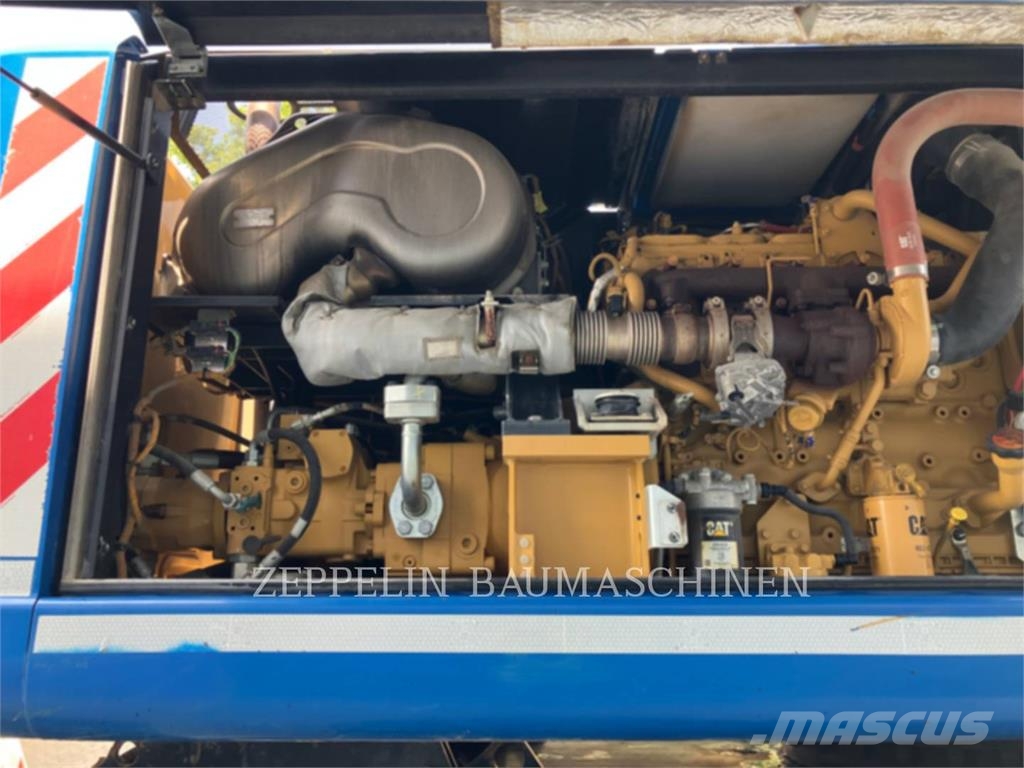 CAT M320F Bagri na kolesih