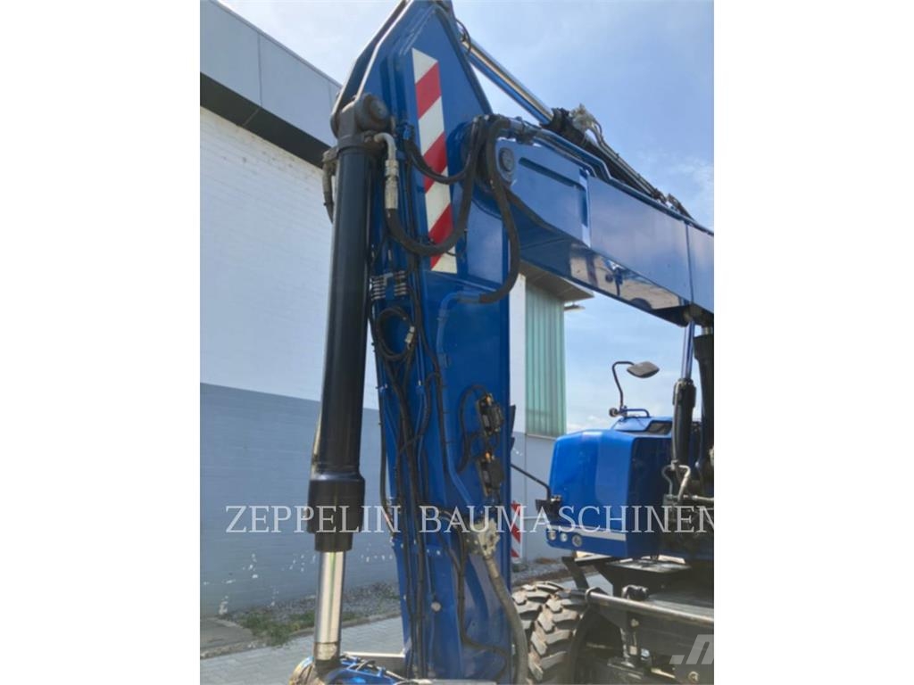 CAT M320F Bagri na kolesih