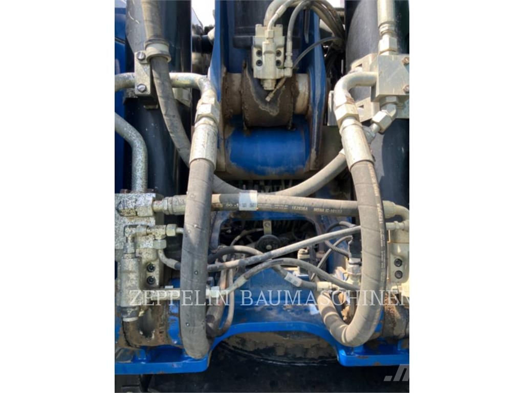 CAT M320F Bagri na kolesih