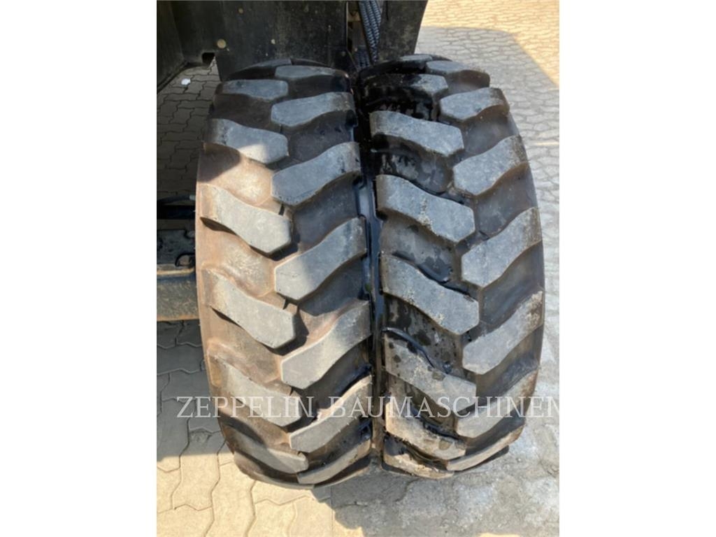 CAT M320F Bagri na kolesih