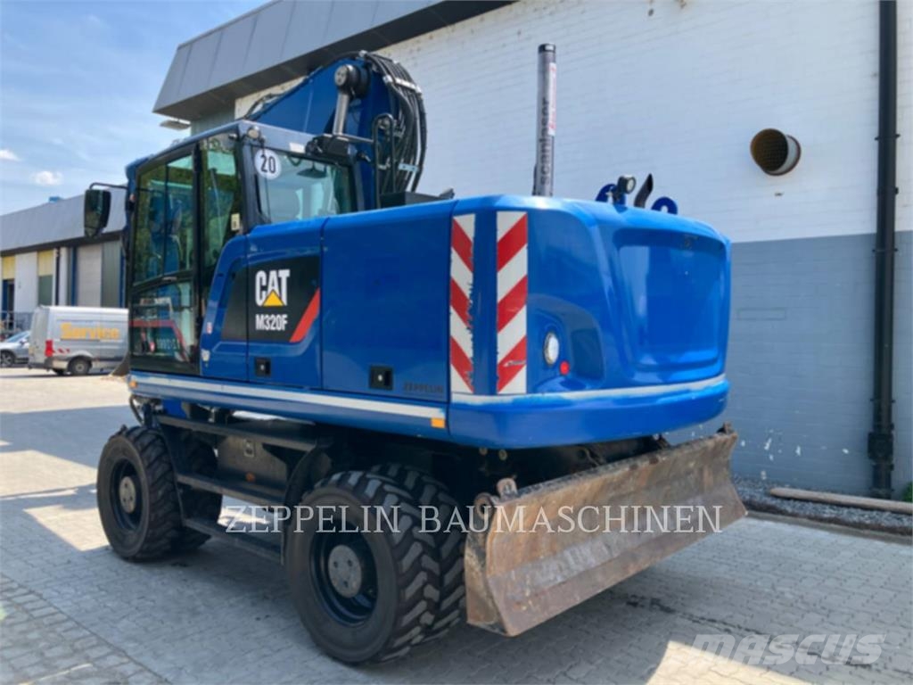 CAT M320F Bagri na kolesih