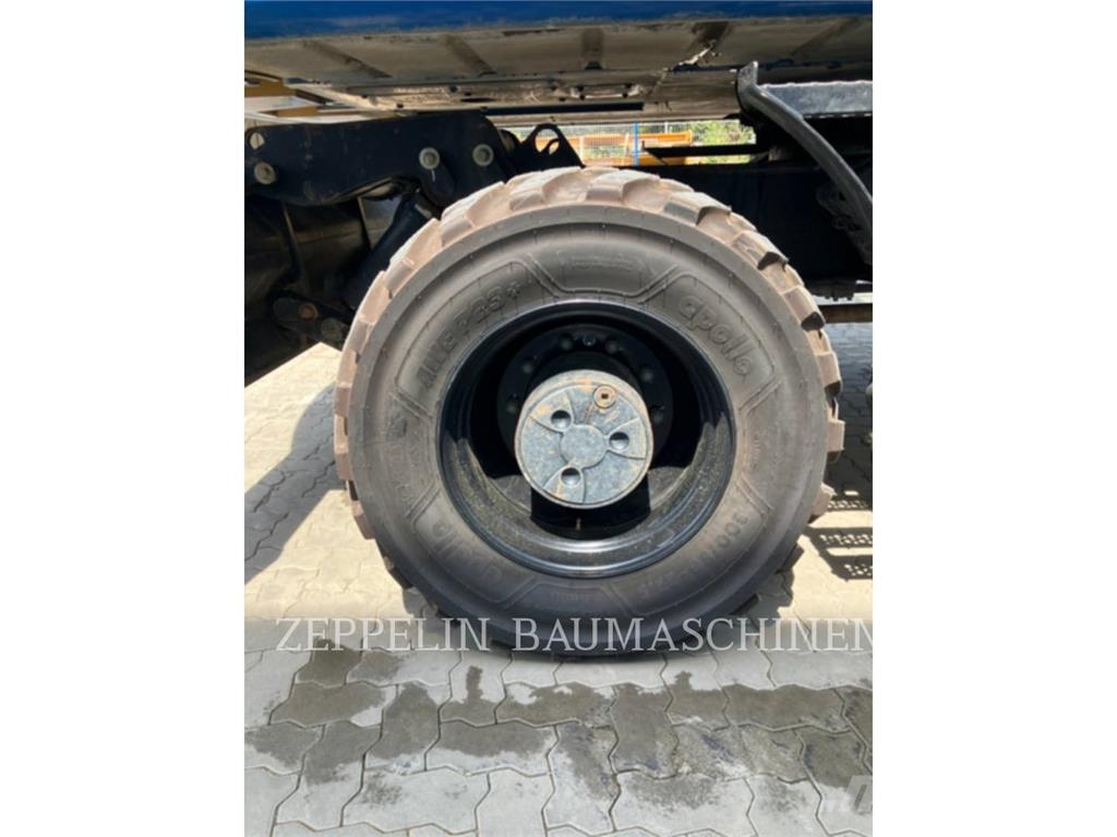 CAT M320F Bagri na kolesih