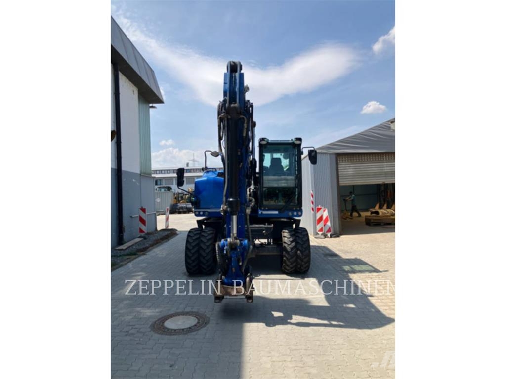 CAT M320F Bagri na kolesih