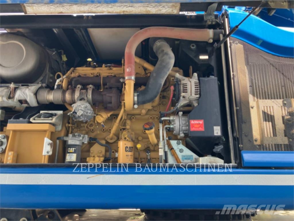 CAT M320F Bagri na kolesih