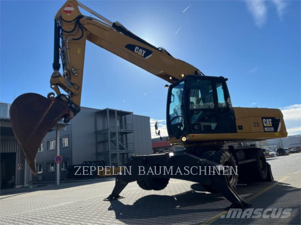 CAT M322D Ekskavatori uz riteņiem