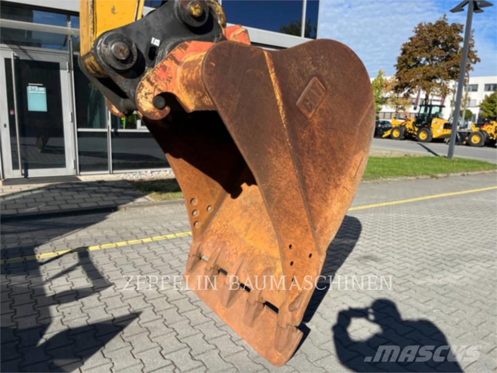 CAT M322D Ekskavatori uz riteņiem