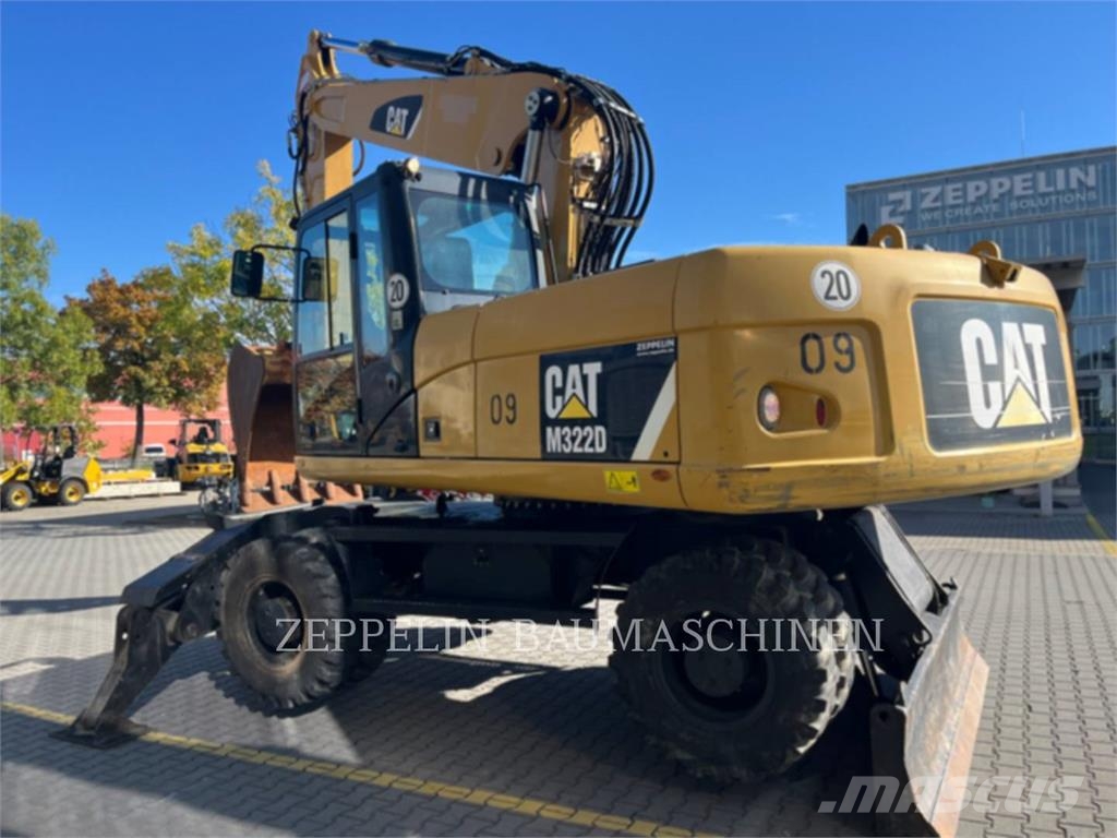 CAT M322D Ekskavatori uz riteņiem