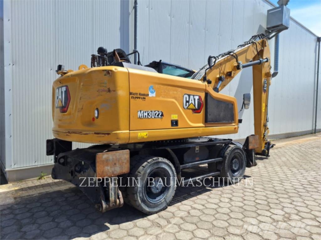 CAT MH3022-06C Griovimo ekskavatoriai