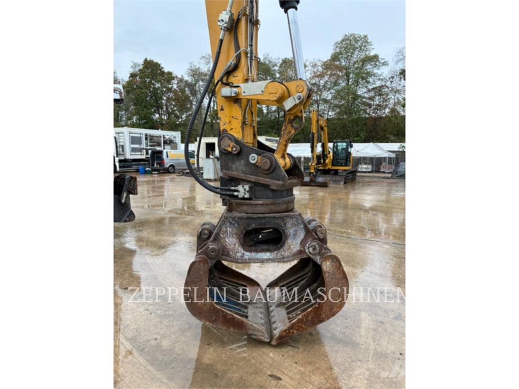 CAT MH3022-06C Demontāžas ekskavators