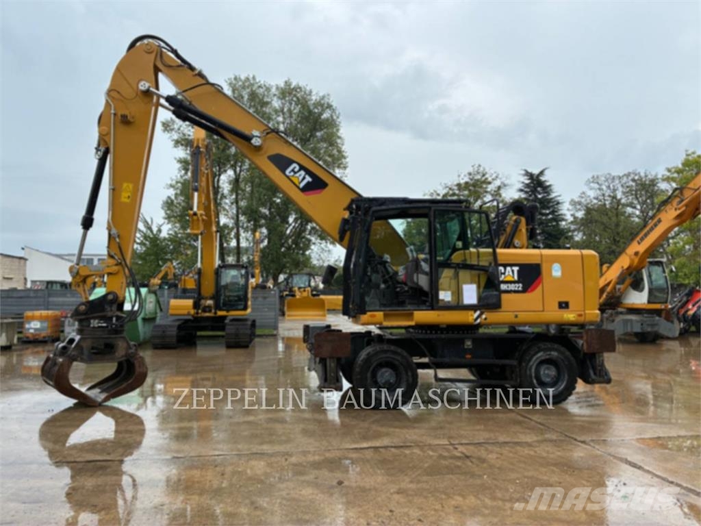 CAT MH3022-06C Demontāžas ekskavators