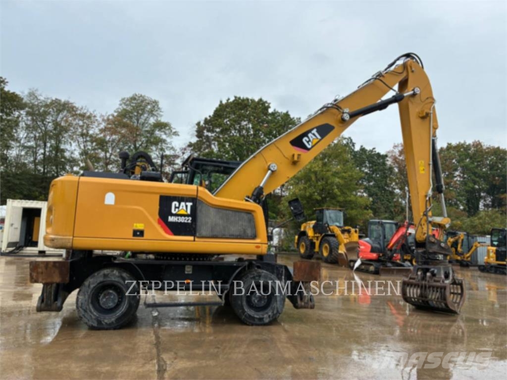 CAT MH3022-06C Demontāžas ekskavators
