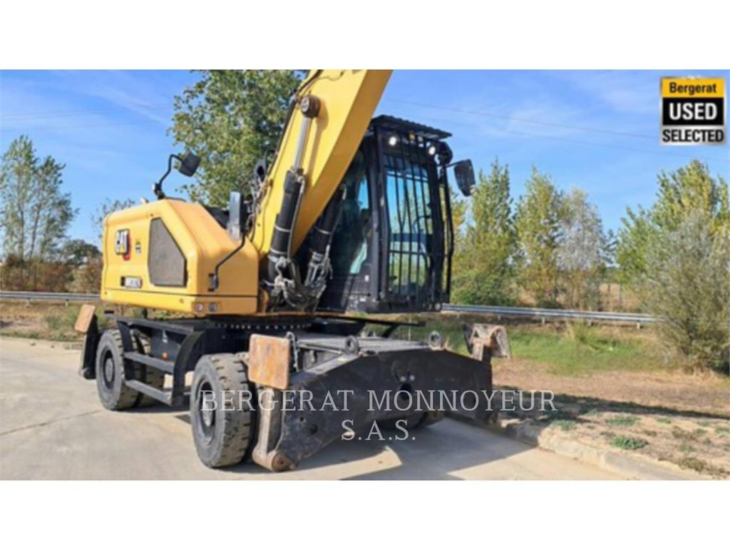 CAT MH3024 Pelle sur pneus