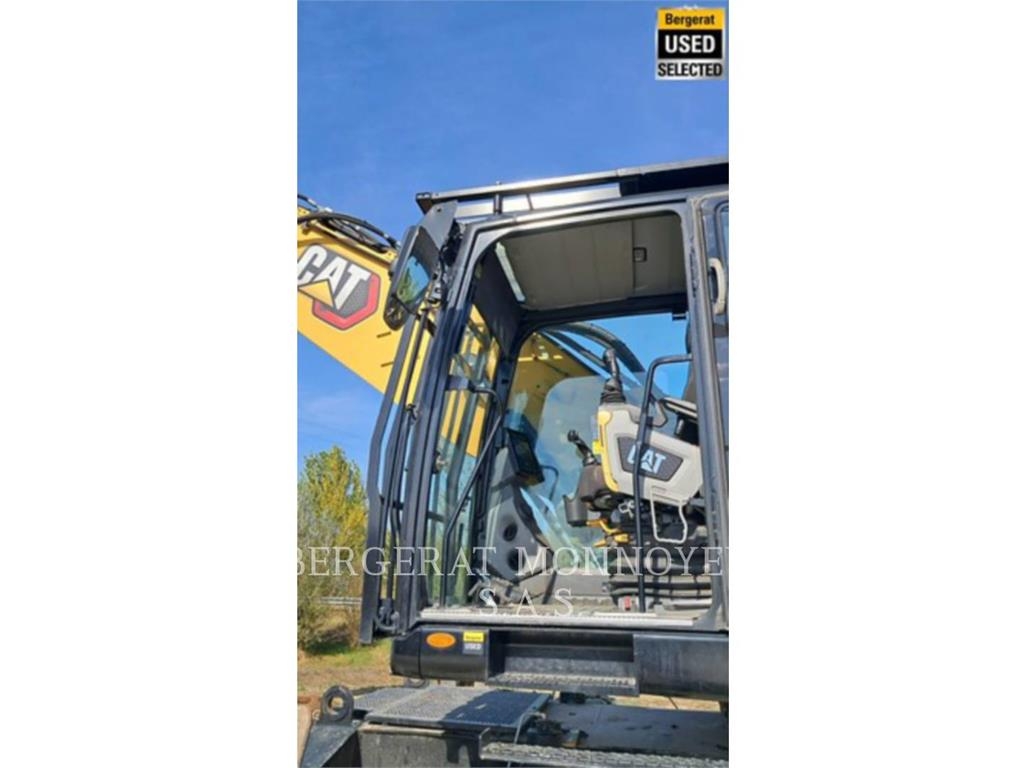 CAT MH3024 Pelle sur pneus