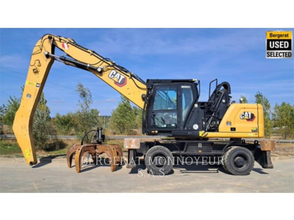 CAT MH3024 Pelle sur pneus