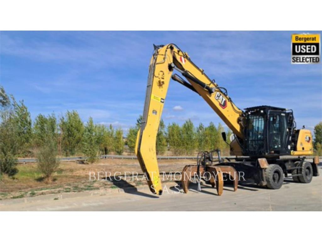 CAT MH3024 Pelle sur pneus