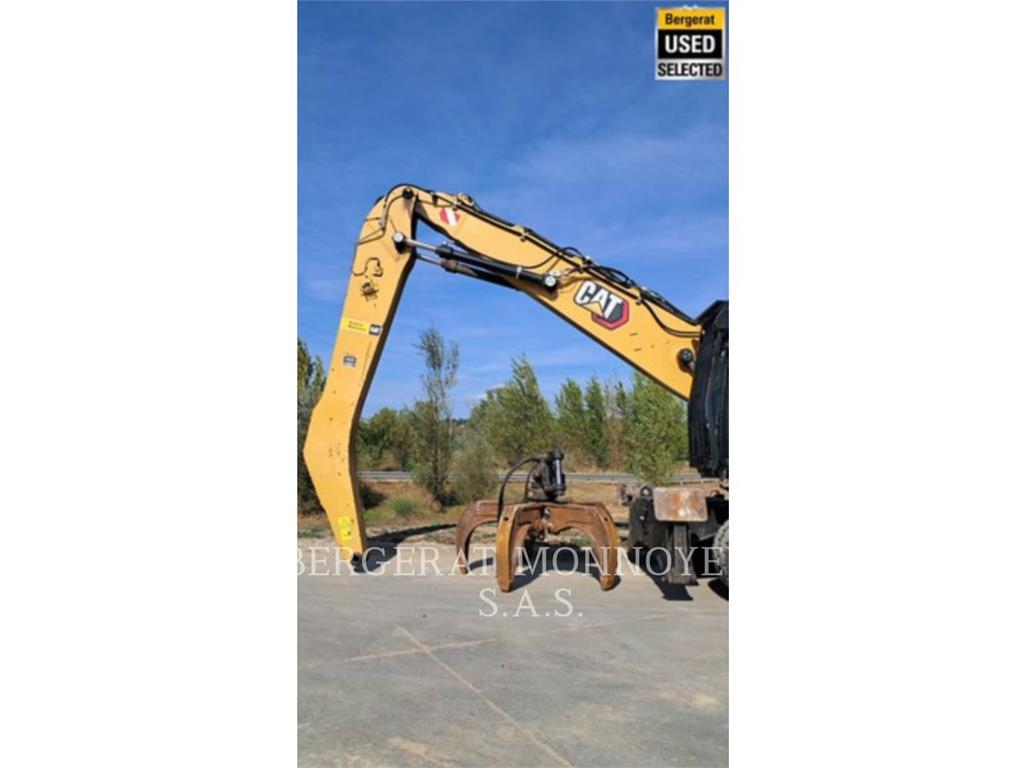 CAT MH3024 Pelle sur pneus