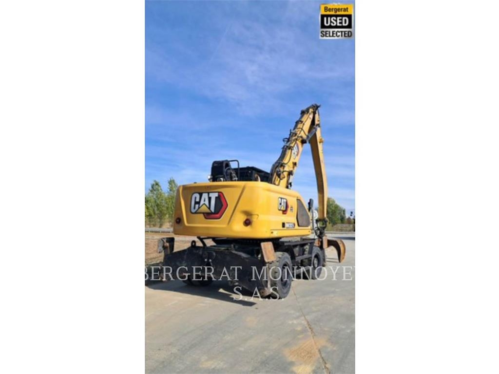 CAT MH3024 Pelle sur pneus