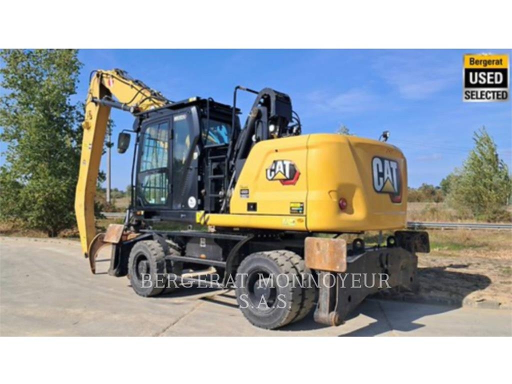 CAT MH3024 Pelle sur pneus
