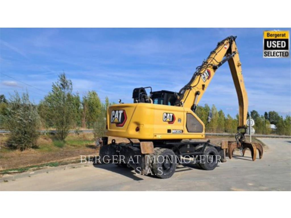CAT MH3024 Pelle sur pneus