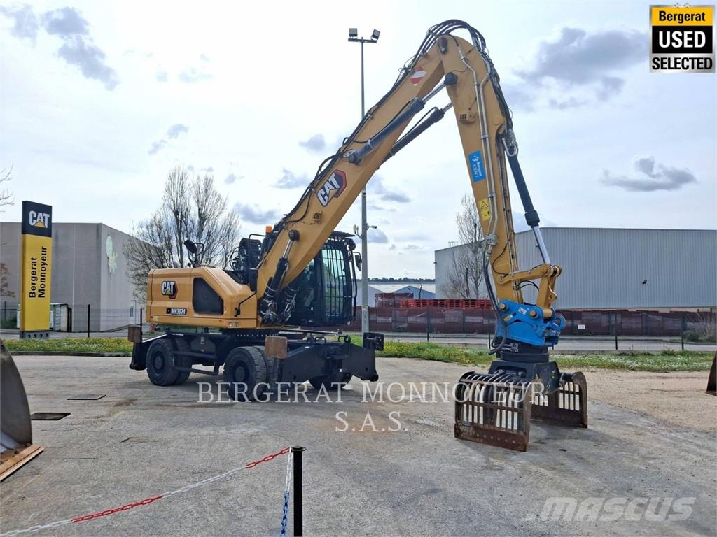 CAT MH3024 Pelle sur pneus