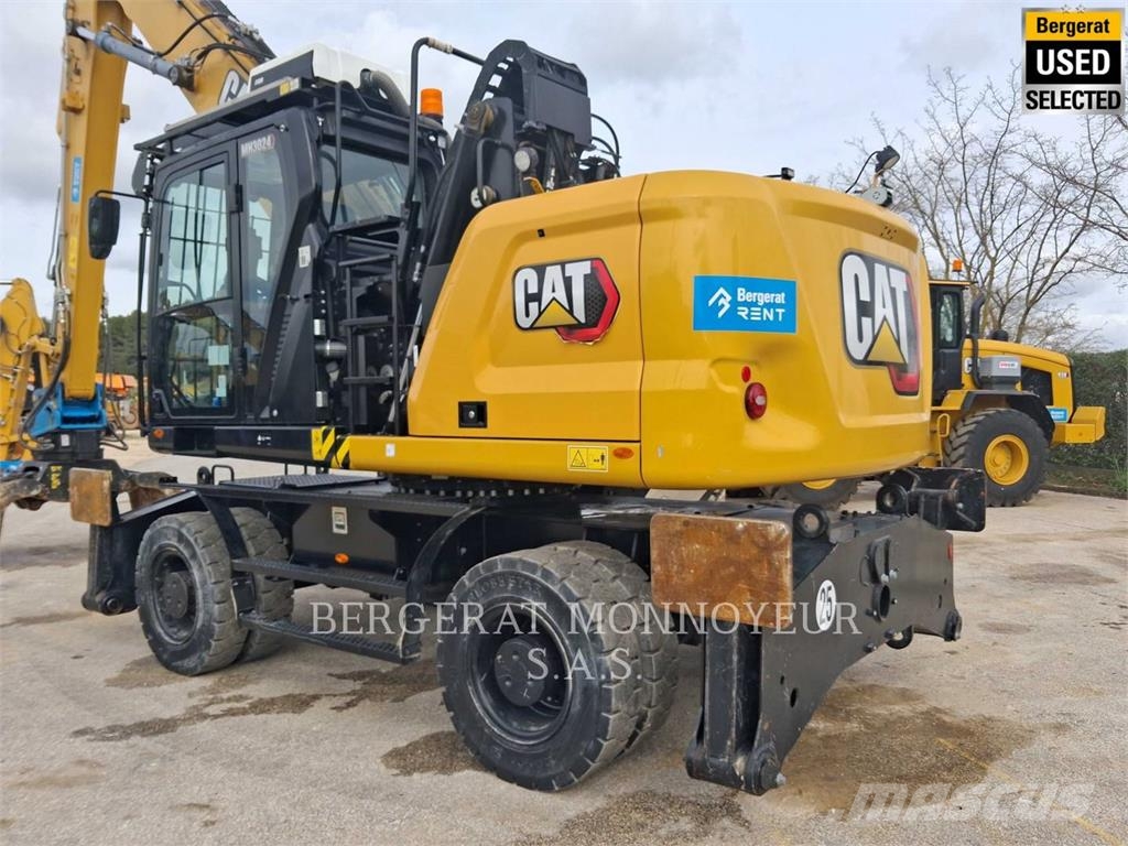CAT MH3024 Pelle sur pneus