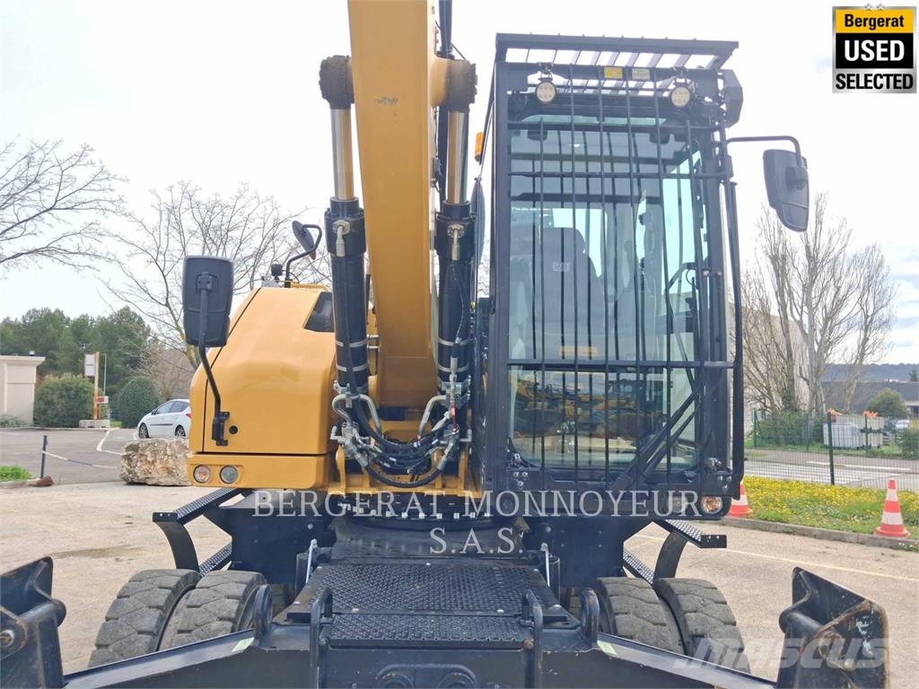 CAT MH3024 Pelle sur pneus