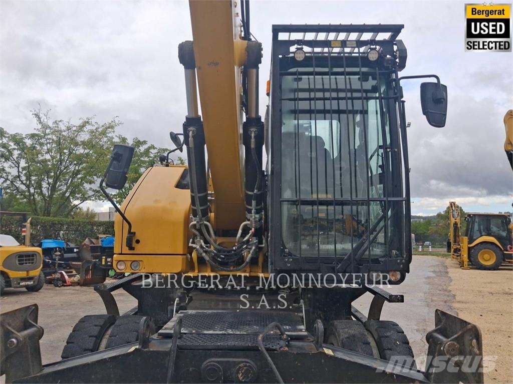 CAT MH3024 Pelle sur pneus