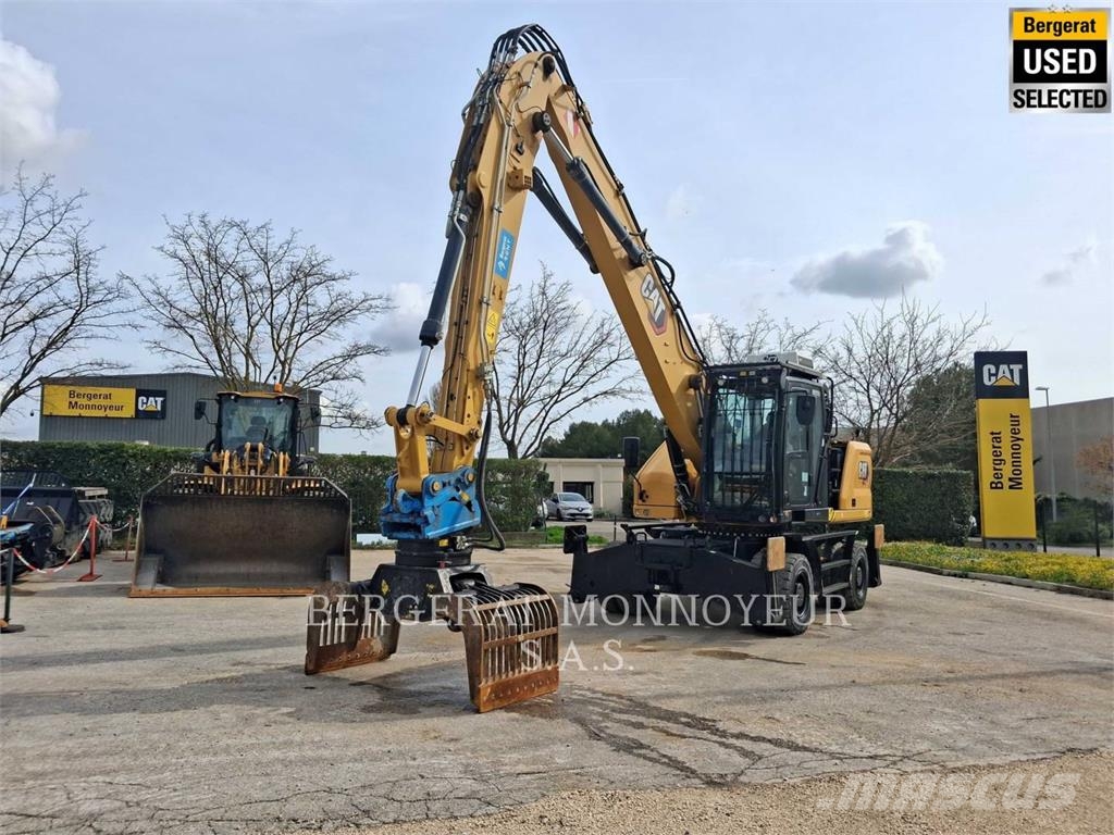 CAT MH3024 Pelle sur pneus