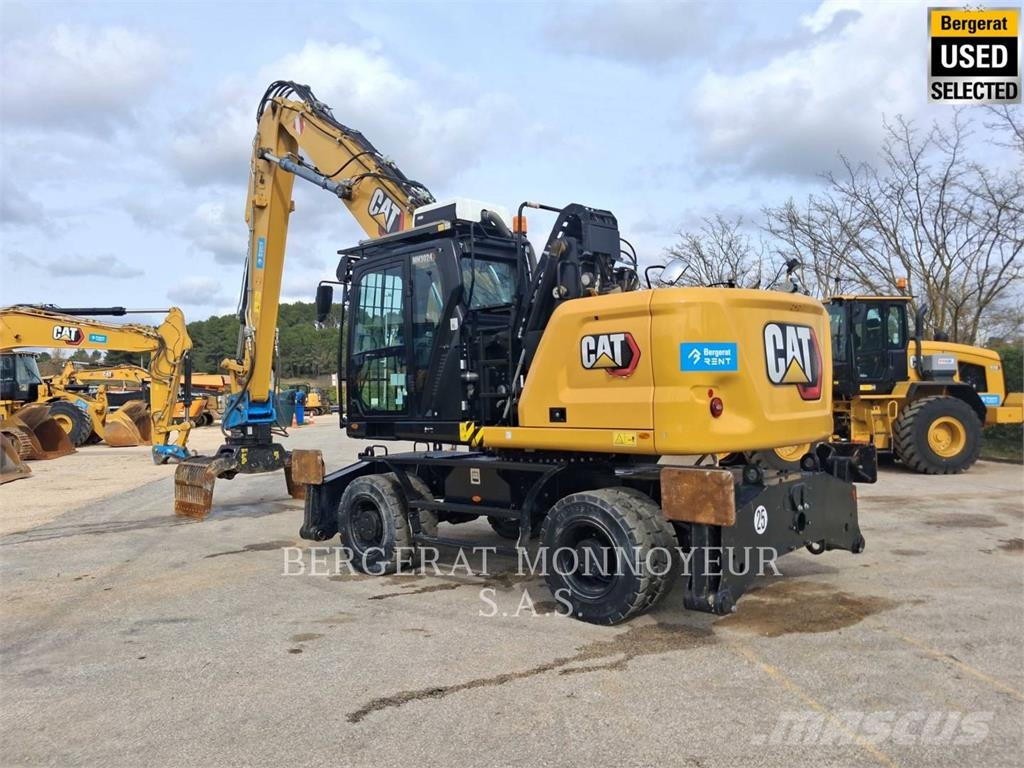 CAT MH3024 Pelle sur pneus