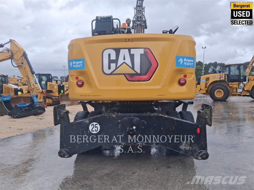 CAT MH3024 Pelle sur pneus