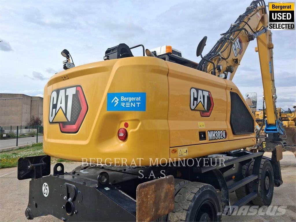 CAT MH3024 Pelle sur pneus
