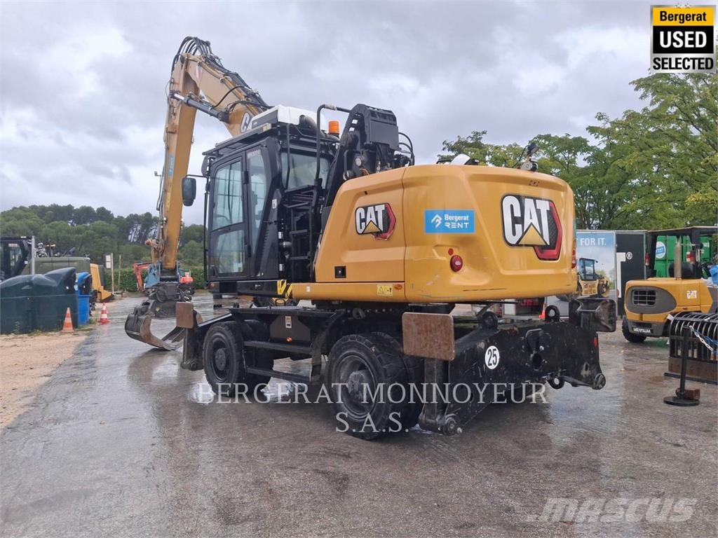CAT MH3024 Pelle sur pneus