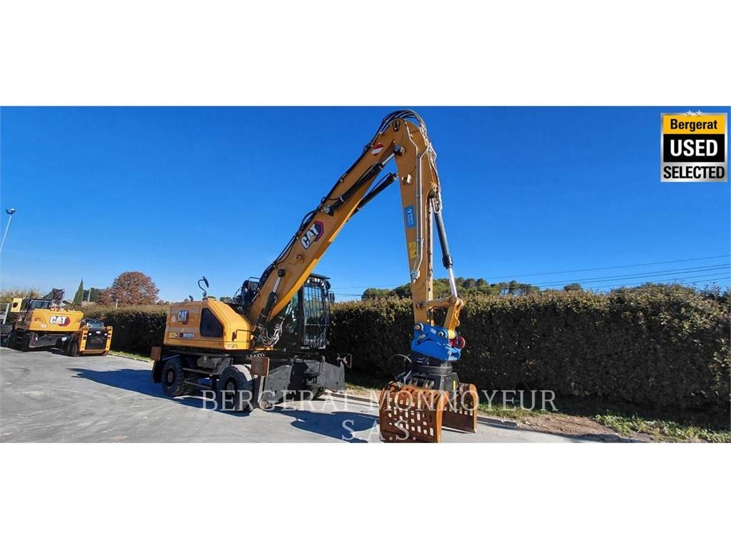 CAT MH3024 حفارات بعجل