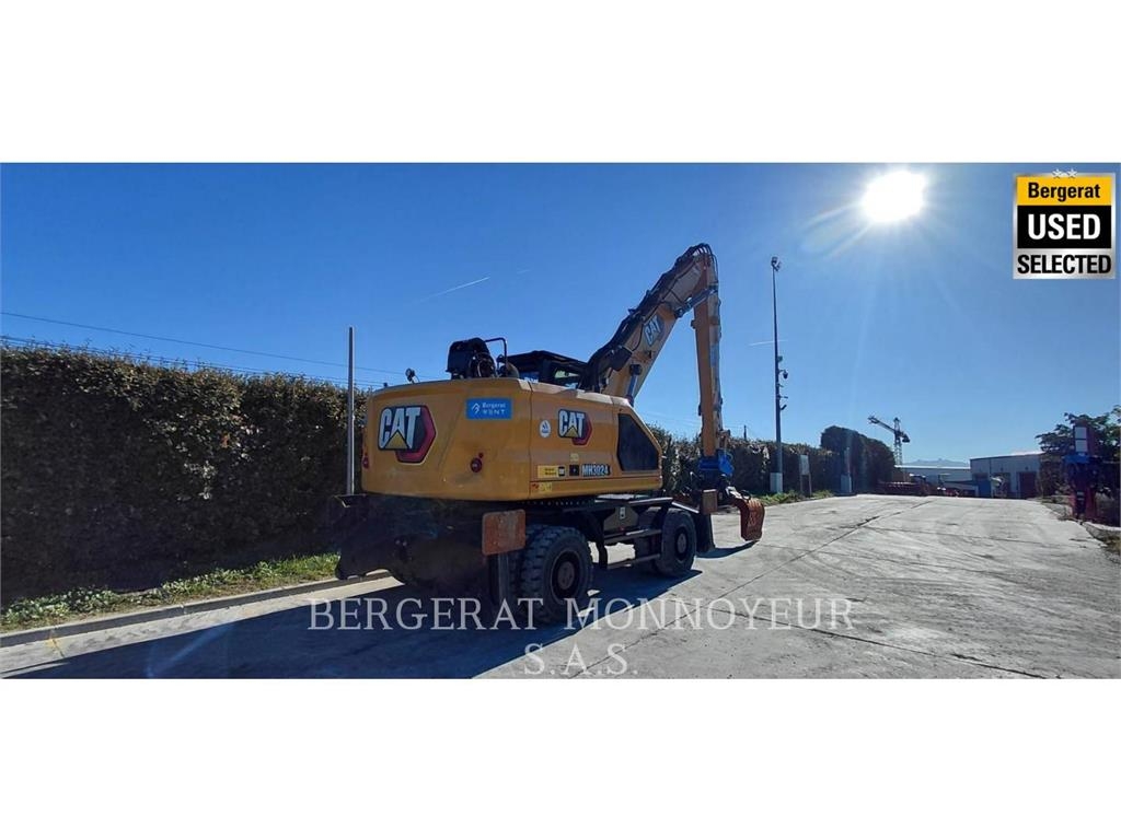 CAT MH3024 حفارات بعجل