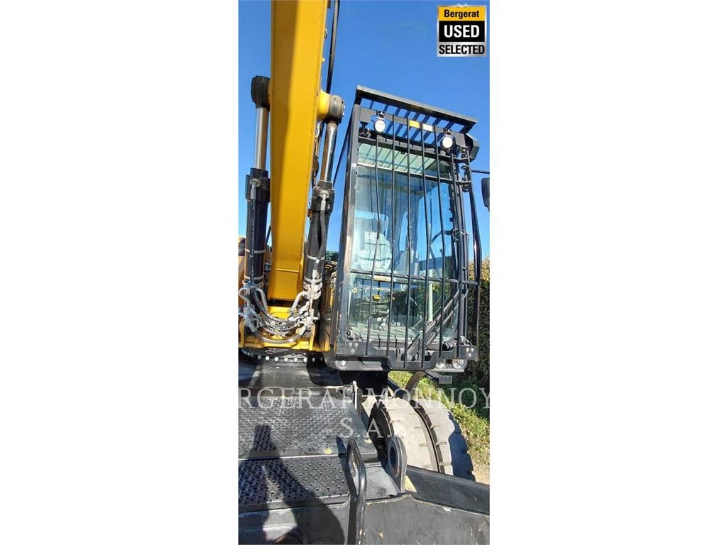 CAT MH3024 حفارات بعجل