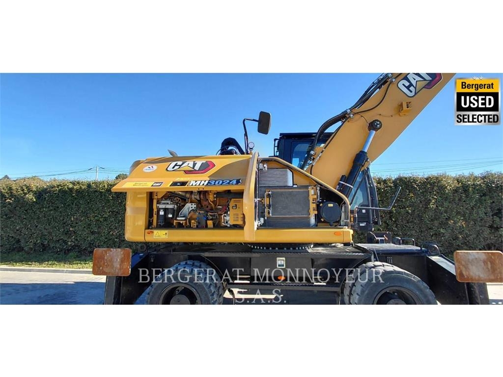CAT MH3024 حفارات بعجل